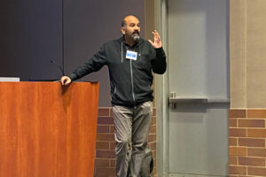 UCI Neuroscience Professor, Dr. Sunil Gandhi gives presentation to Neuroscholars