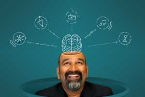 Sunil Gandhi Takes a Look Inside the Brain -image of Sunil Gandhi with illustration of brain