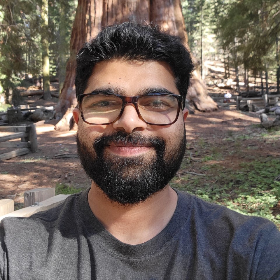 Aditya Singh - pictured in front of a redwood tree