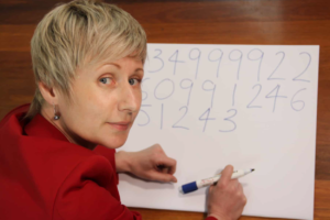 What’s it like living with a phenomenal memory and can it be learned? - image of Anastasia Woolmer memorizing digits