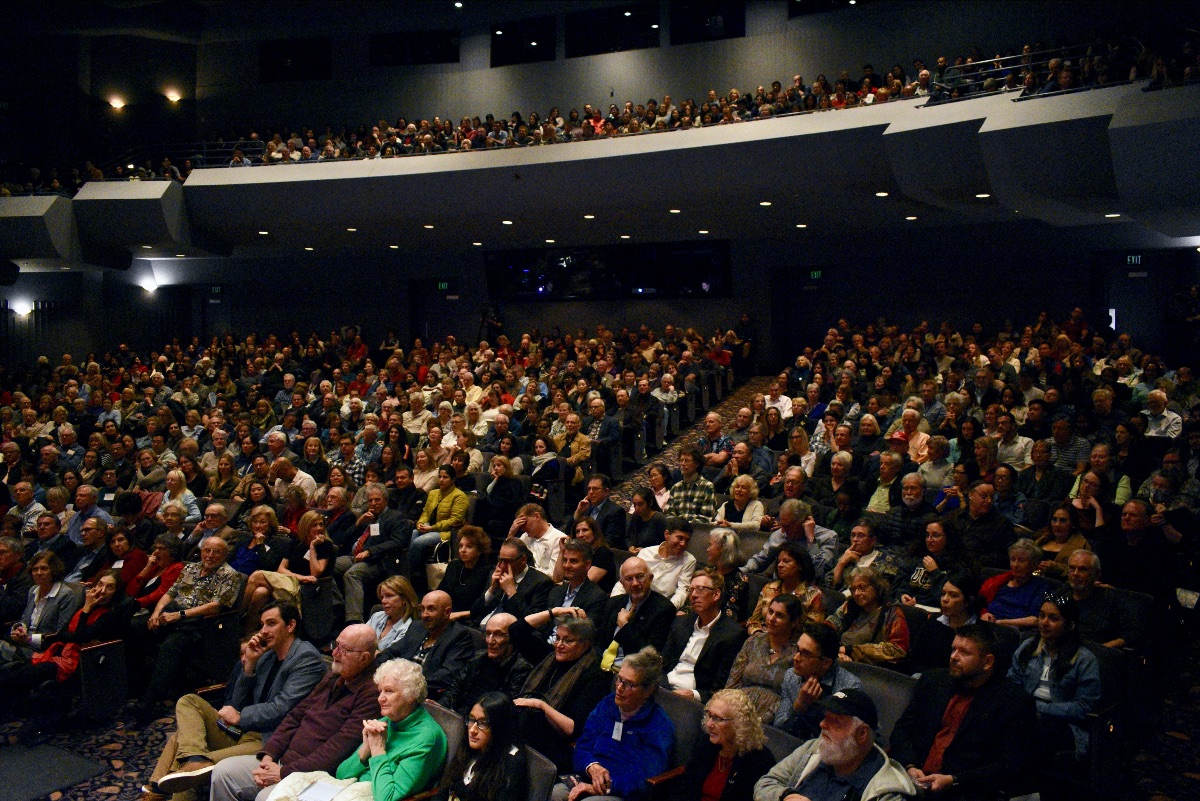 CNLM Earns University Designation as an Organized Research Unit - image of crowd of people in Irvine Barclay Theatre for lecture by CNLM Founder, Jim McGaugh
