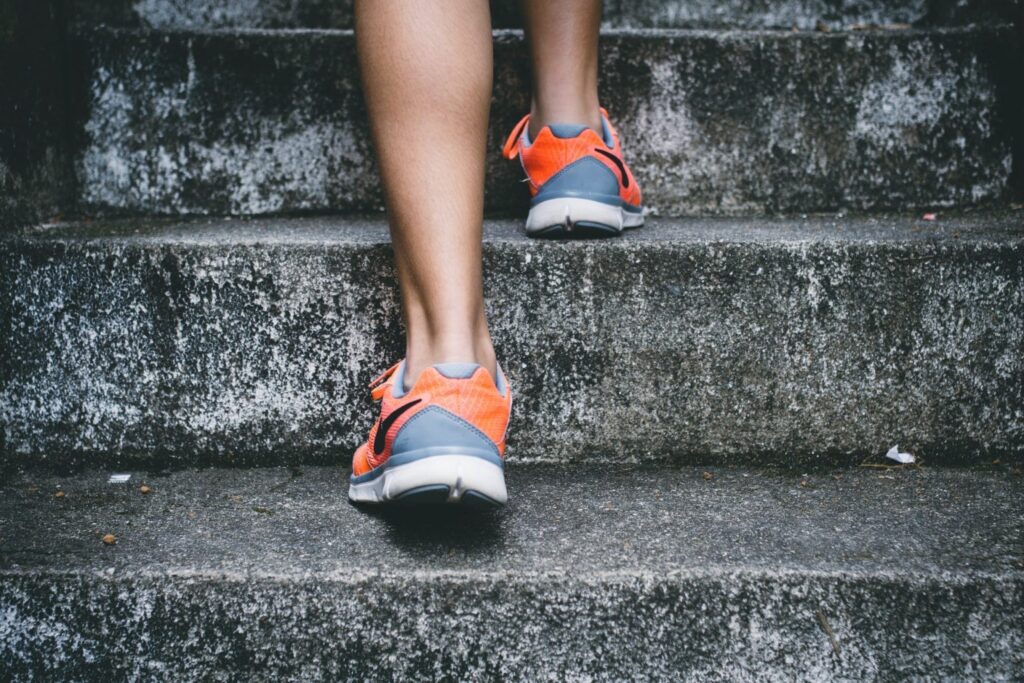 Study Shows That Mild Physical Activity Can Improve Brain Function - image of runner walking up steps