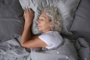 Trouble sleeping? It could mean higher Alzheimer's risk. - Image of senior woman sleeping