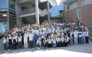 Irvine Brain Bee participants, organizers and volunteers gathered outside the Anteater Learning Pavilion building